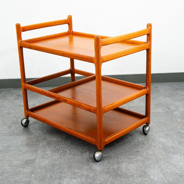 Extremely high quality solid teak bar cart by Johannes Andersen for Silkeborg Mobler. Very fine details and construction....