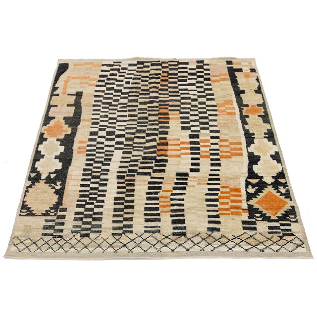 Experience the blend of heritage and modern design with this hand-knotted Moroccan wool rug. Crafted from 100% premium...