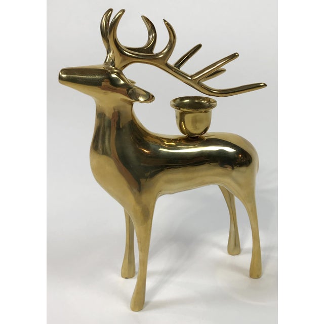 Make it sparkle this holiday season! Simple and chic, this vintage brass stag deer candle holder is an ideal addition to...