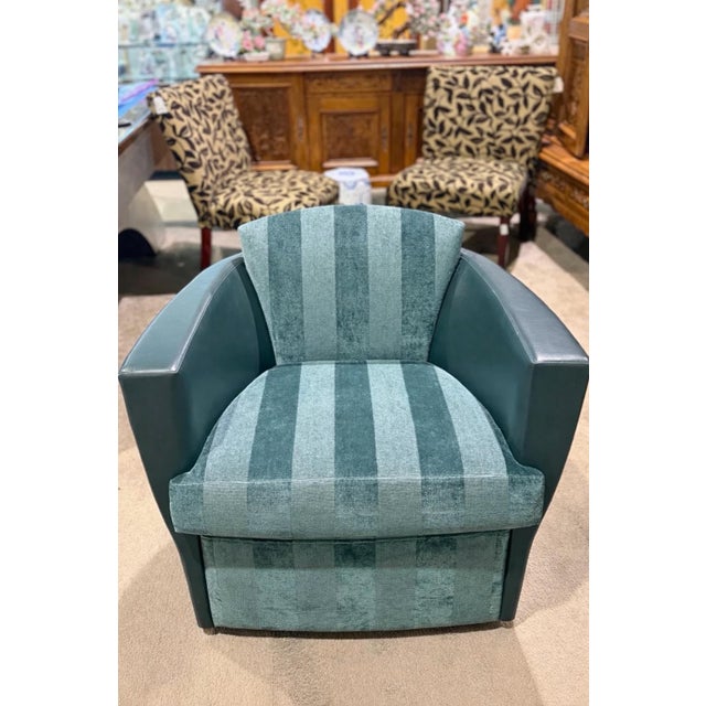 Add modern comfort and sleek style to your space with this contemporary dark green bucket swivel chair. Designed with a...