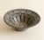 Elegant ceramic bowl by French artist Jacques Pouchain, Dieulefit, circa 1960s. Wheel-thrown stoneware with a gray-brown...