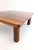 Vintage Italian walnut coffee table from the late 1960s featuring a square wooden top with a beautiful striped wood inlay...