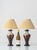 Glazed in a flowing flambé that pours from a cobalt-blue collar down through cream, oxblood, and chestnut into a deep...