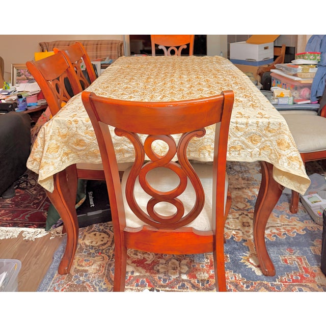 This tablecloth comes with eight matching embroidered brand new napkins never used. The tablecloth was put to use only...