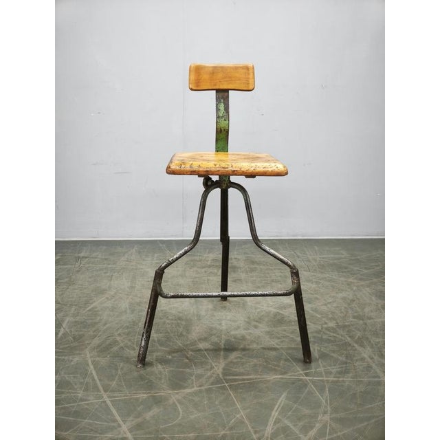 An authentic industrial workshop chair manufactured in Czechoslovakia during the 1940s. Constructed from solid iron with a...