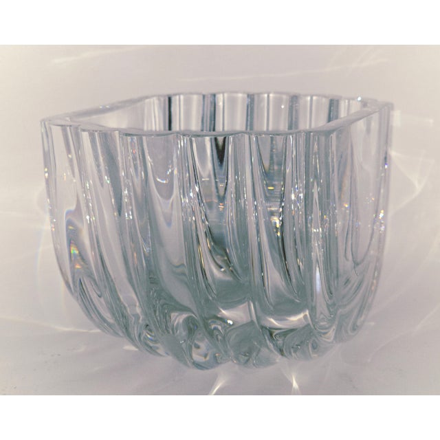 A striking example of Scandinavian modernism, this clear art glass vase/bowl by Goran Wärf for Kosta Boda showcases the...