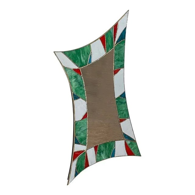 Sagomata mirror, with wooden structure entirely handmade, golden brass profiles, surface finishes in green, red and blue...