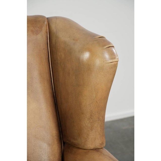 Light Cowhide Wing Armchair with a Timeless English Look and Good Seating Comfort For Sale - Image 9 of 14