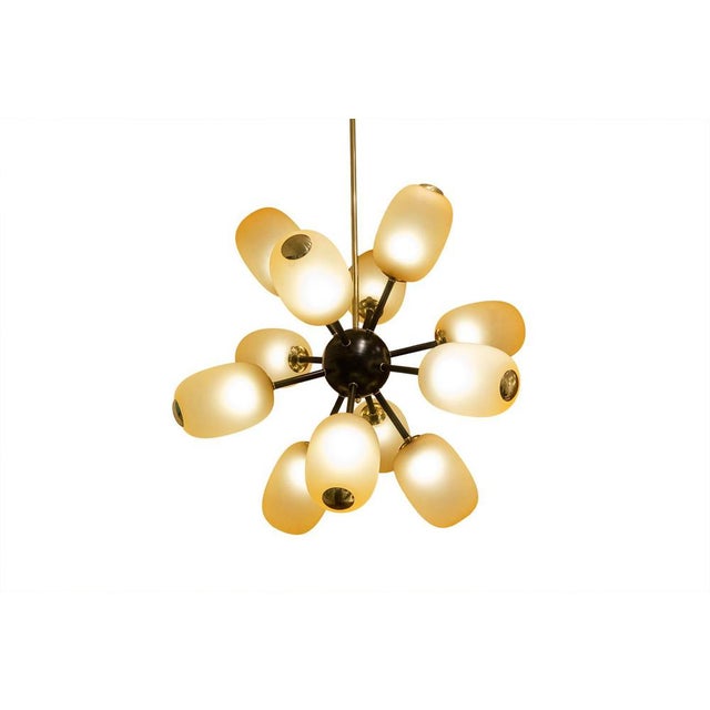 Sputnik Star Chandelier in Brass and Glass, in Good conditions. Designed from 2000 This piece is designed in the style of...