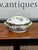 This is a Herend Queen Victoria porcelain tureen featuring a delicate branch handle and colorful painted butterflies....