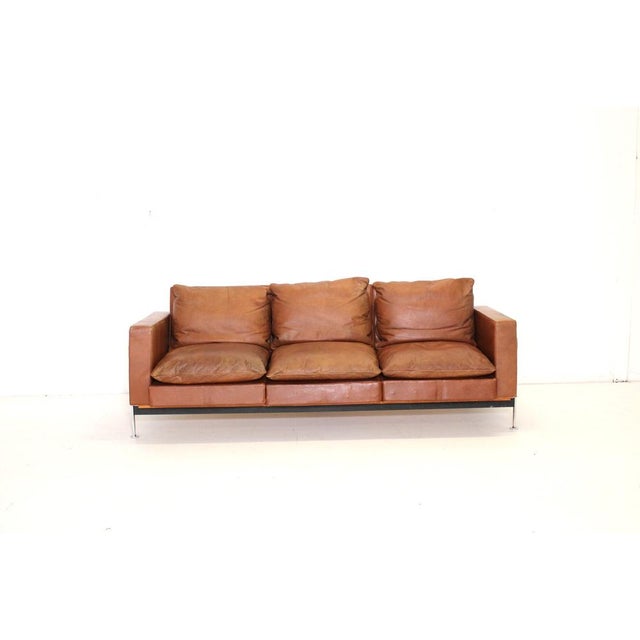 Manufacturer: De Sede Designers: Robert & Trix Haussmann Color: brown Model: RH-302 Dimensions: approx. width 220 cm,...