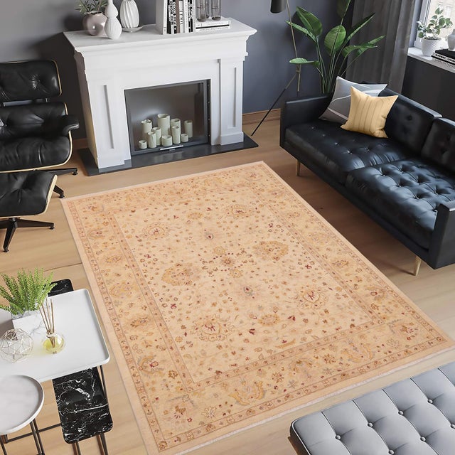 "Enhance the ambiance of your home with this magnificent Persian-influenced Turkish hand-knotted rug made by skilled...
