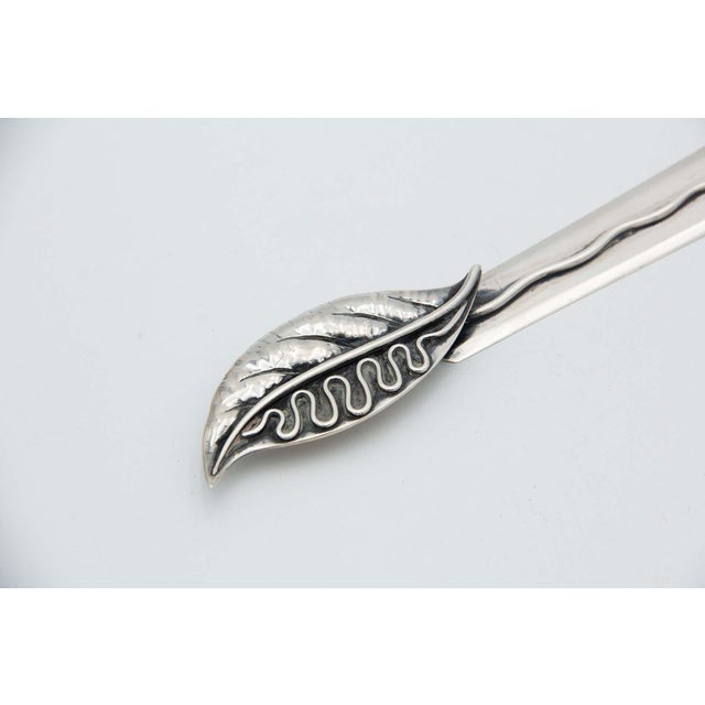 Silver Letter Opener with Embossed Leaf-Shaped Handle, in Good conditions. Designed 1920 to 1949