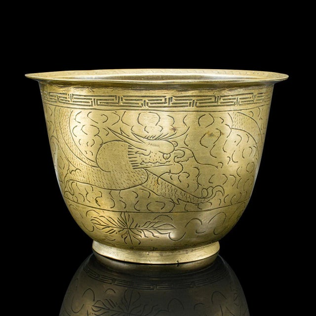 This is an antique jardiniere dish. A Japanese, a bronze Meiji era decorative planter bowl, dating to the late Victorian...