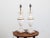 A pair of marble and bronze vase-shaped table lamps from the early 20th century, with volutes and lucite bases. Created in...