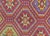 This Vintage Turkish Kilim was hand-woven in the Oushak region of Turkey using wool on a wool foundation. At a size of...
