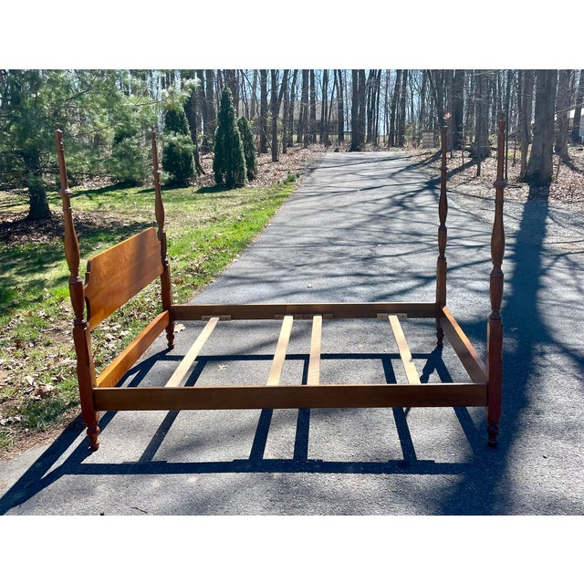 Elevate your primary suite with the timeless elegance of this L. & J.G. Stickley Georgian-style four-poster bed. Crafted...
