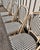 French Vintage Indoor/Outdoor Stackable Woven Riviera Bistro Chairs- Set of 4 For Sale - Image 3 of 11