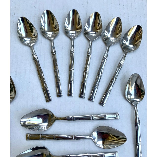 Complete set of 12 teaspoons, perfect for ice cream, dessert, or tea and coffee service. Marked Stainless, Korea. Circa...