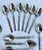 Complete set of 12 teaspoons, perfect for ice cream, dessert, or tea and coffee service. Marked Stainless, Korea. Circa...