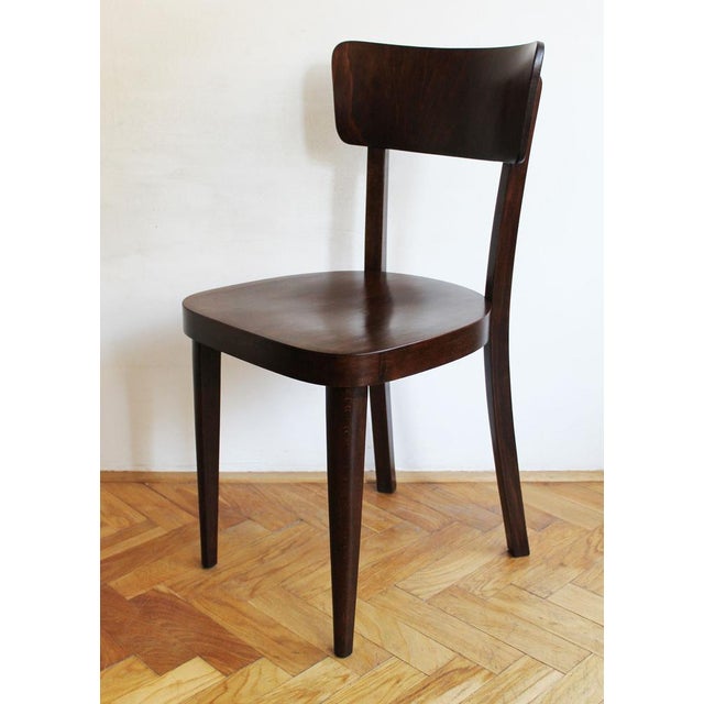 This stylish dining chair is an original Thonet design from 1936, listed in the company’s sales catalogue as model no. A...