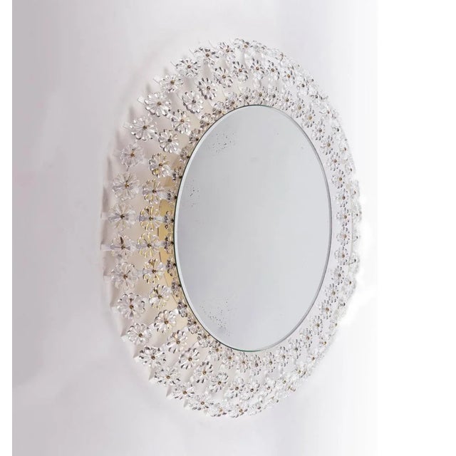 Luxury and timelessly modern large illuminated mirror in the rare Ø 25.6" in. (65 cm) version in the style of Emil Stejnar...