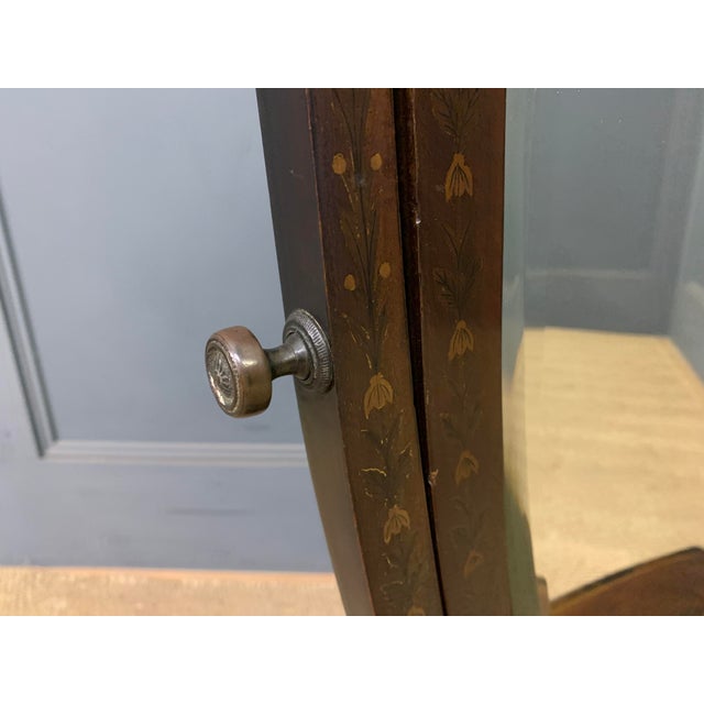 A superior George III period toilet, or dressing, mirror of generous proportions. Well constructed in mahogany with cross...