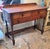 Early American wooden desk. Very charming piece. It has 3 working drawers. Traditional spindle legs. The wood had that...