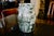 Pitcher with a lovely erotic and animal decoration by Blin, signed, depicting a nude woman lying in a cart pulled by...