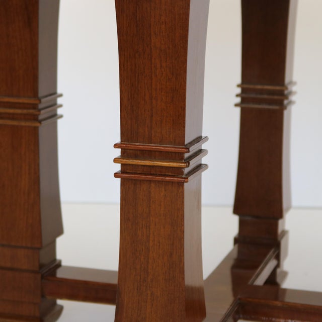 Modernist side table from France circa 1940. The circular top is veneered in spectacular wood to create a starburst...