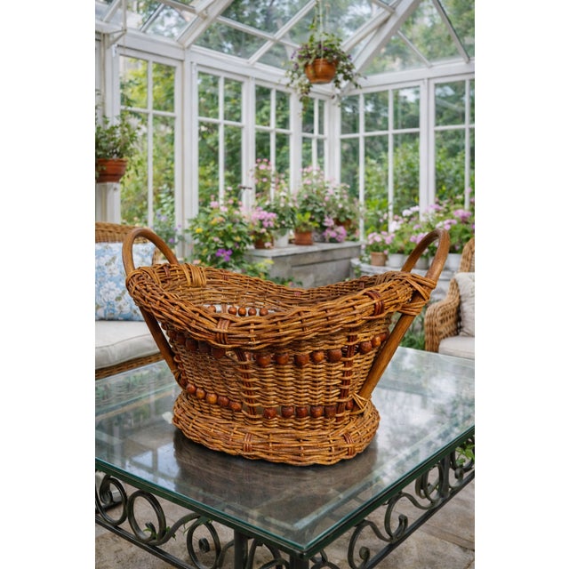 Vintage 1970s Honey-Toned Wicker Basket With Wood Bead Detail & Sculptural Handles For Sale - Image 9 of 9