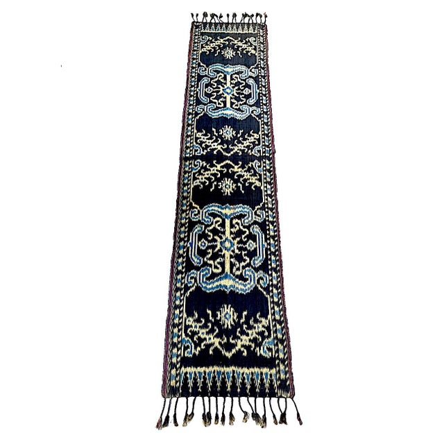 Offered is a 1950s-1960s hand woven Indonesian Sumba Island Hinggi Textile with hand knotted fringe. It's a thick cotton...