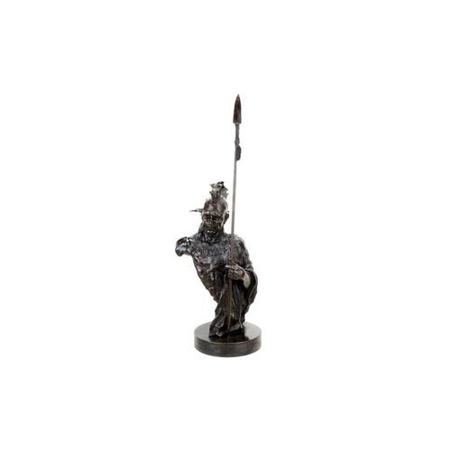 Indian Sculpture in patinated bronze, western style, after Frederic Remington. This bronze sculpture depicts a Native...