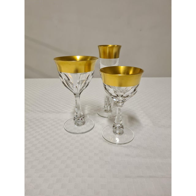 Set of glasses in crystal and pure gold. Set of 36 hand-cut and mouth-blown crystal glasses with 30% lead oxide. Produced...