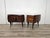 Elegant pair of 1950s mahogany nightstands, featuring a beautiful burl grain that lends depth and sophistication. The...