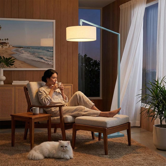 The Stretch Arc Lamp is a modern lighting solution designed by Kirby Groce in 2011, featuring a striking turquoise steel...