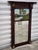 A beautiful exemple of an early 19th century Federal style mahagony carved wood trumeau mirror with reverse painting....