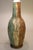 A massive and demanding Brutalist styled multi layered Lava drip glaze art pottery ceramic table lamp designed and...