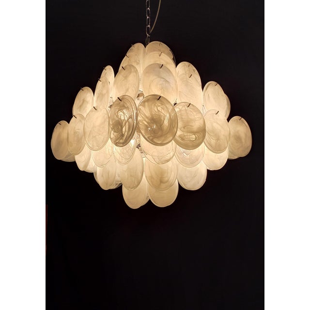 Vintage murano chandelier, mazzega style, 1980s. Beautiful square chandelier with 7 glass tiers. The glass is made of...