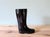 This vintage boot-shaped vase is a unique decorative piece that combines humor and elegance. Its figurative design,...