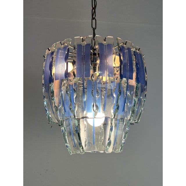Vintage chandelier in colored Murano glass in the style of Zero Quattro, 1970s. Intact and in good condition, metal...