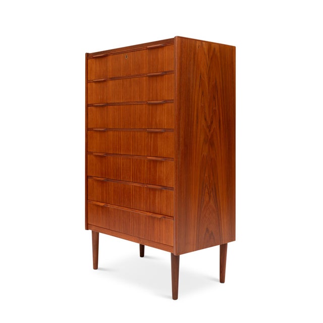 A standout piece of Danish Mid-Century Modern design, this 1960s teak tallboy dresser blends form, function, and...