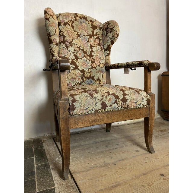 Back ears armchair from the Biedermeierzeit, oak, with historical folding mechanism in wrought iron, three-stage...
