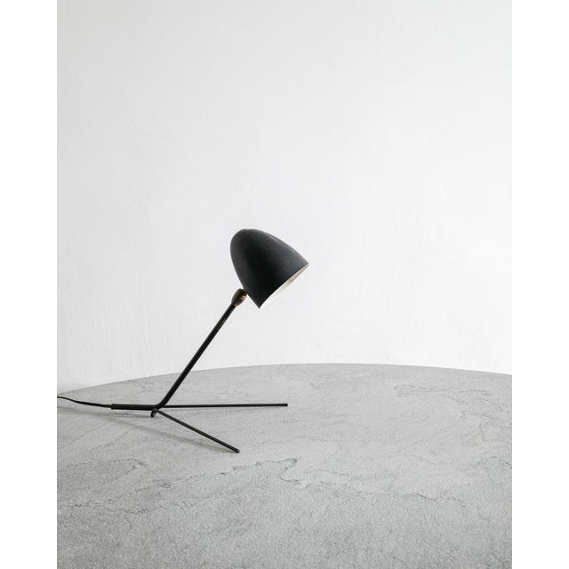 A very rare and iconic decorative french mid century "cocotte" desk / table lamp by serge mouille in black lacquered metal...