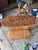 Refurbished McGuire stacked rattan table base with top restored in a faux tortoise shell. This mid century vintage “sheaf...
