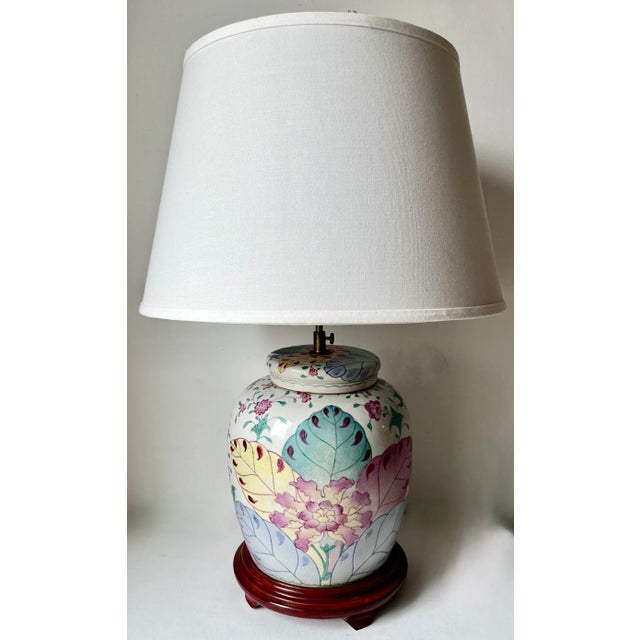 This gorgeous vintage Tobacco Leaf Chinoiserie ceramic lamp features a Pastel palette of soft Pinks, Blues and Aqua on a...