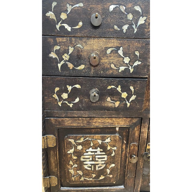 Asian Style 12 drawer cabinet with marble inlaid top and side panels. Late 19th century