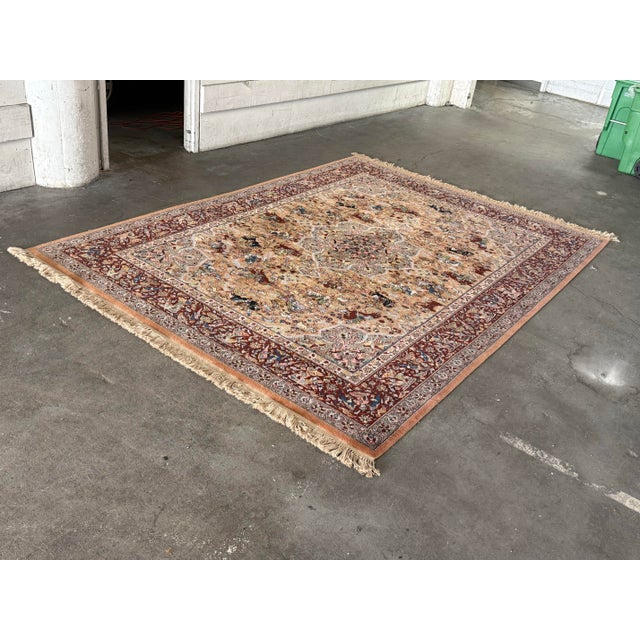 Design Plus Gallery presents a 8ft 8 In x 12ft Karastan Persian Hunting Wool Area Rug. This Karastan rug displays an...