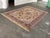 Design Plus Gallery presents a 8ft 8 In x 12ft Karastan Persian Hunting Wool Area Rug. This Karastan rug displays an...