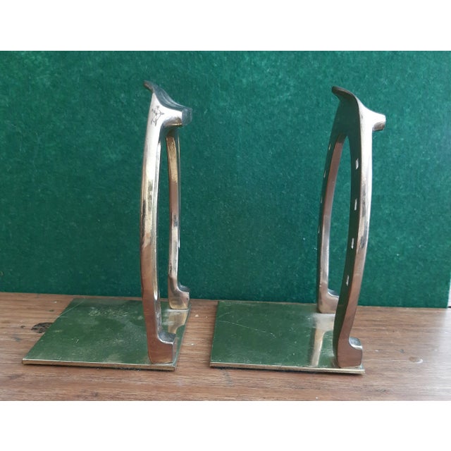 Pair of brass horseshoe bookends. Lightweight and versatile, they fit any decor and add a touch of good luck or a western...